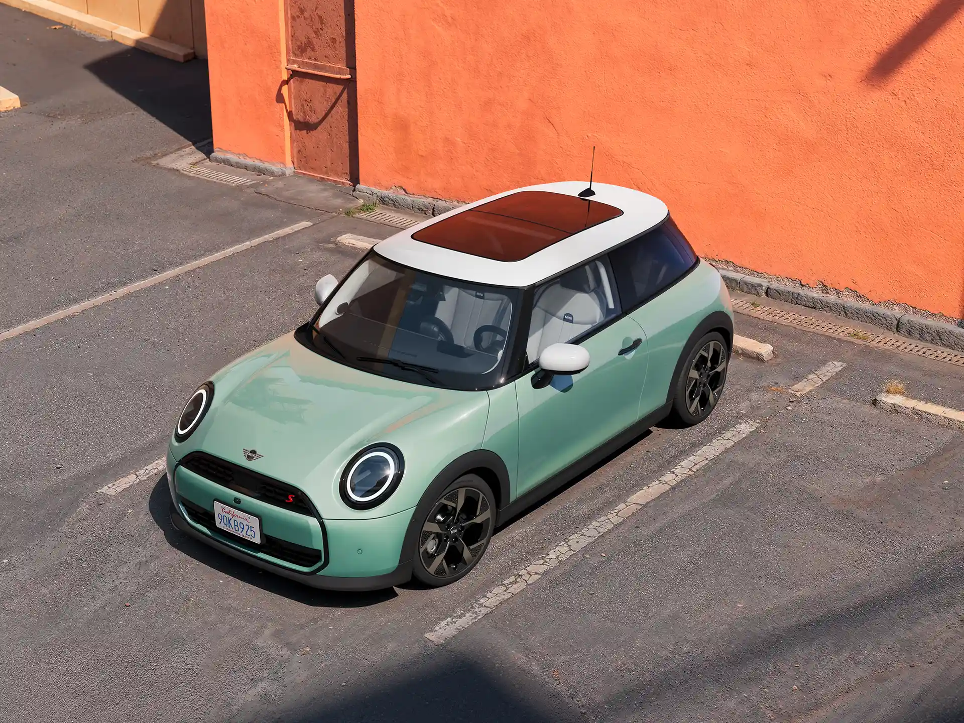 Video showcasing the interior and exterior of a MINI Cooper in detail. The camera pans over the dashboard, highlighting design elements.