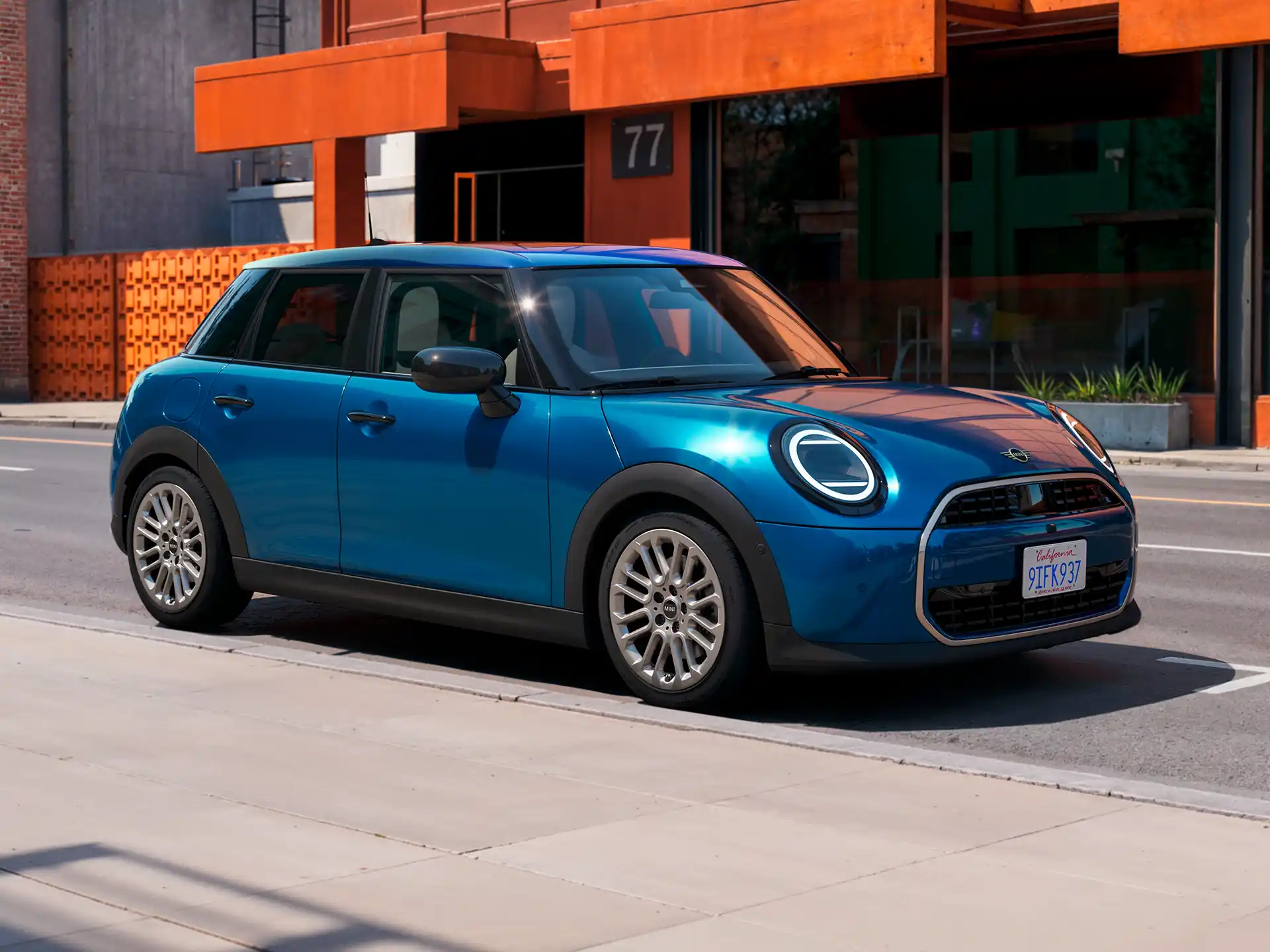 Video showcasing the interior and exterior of a MINI Cooper 5-Door in detail. The camera pans over the dashboard, highlighting design elements.