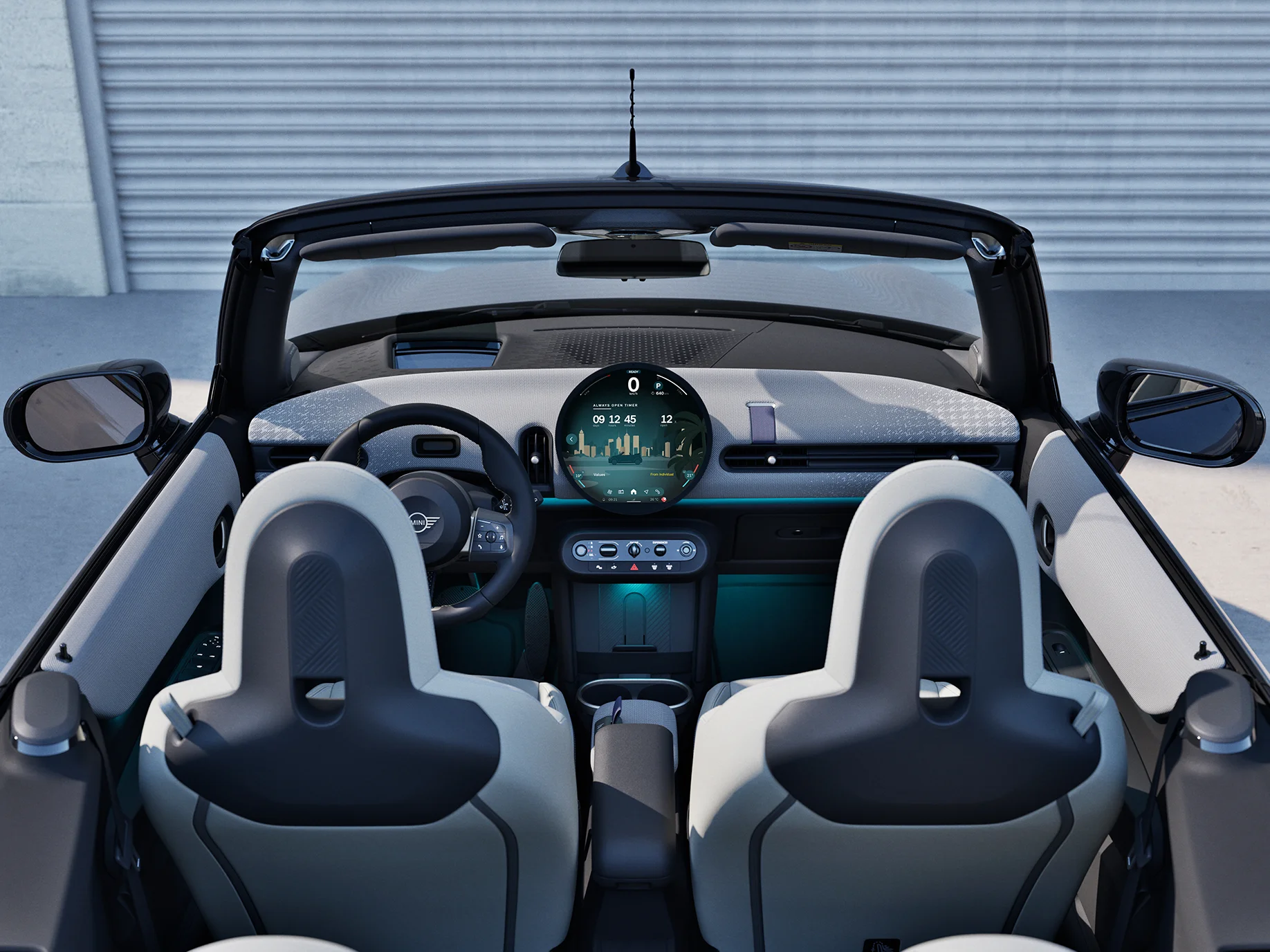 Rear view of the MINI Cooper Convertible interior with focus on the dashboard and the interaction unit.