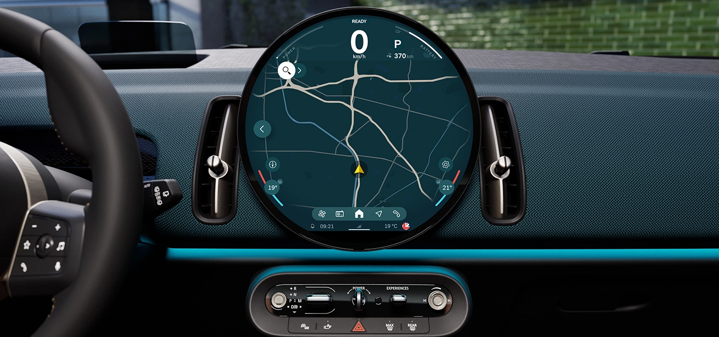 Detail view of the all-electric MINI Countryman interaction unit with focus on the navigation.