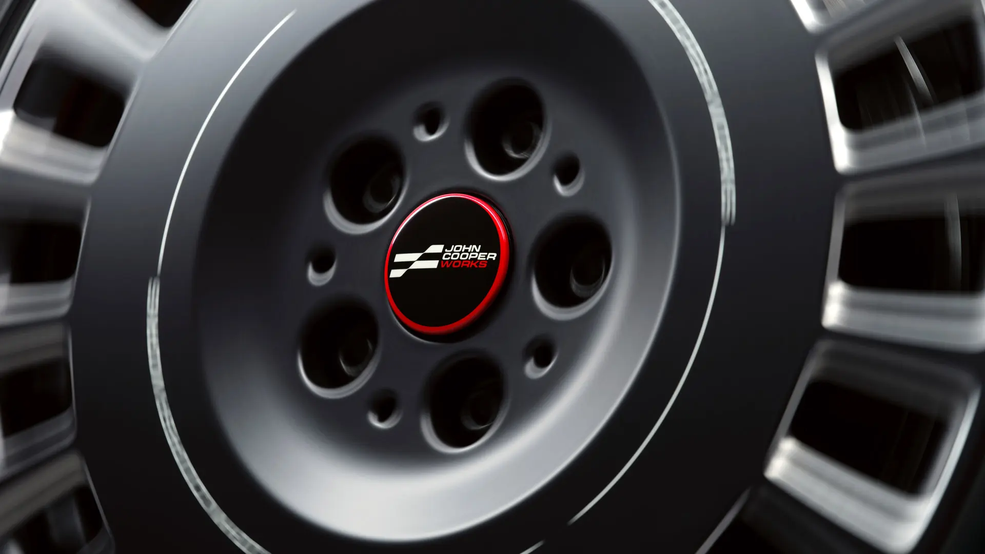 Close-up image of the MINI JCW Floating Hub Cap that remains level as the wheel rotates.