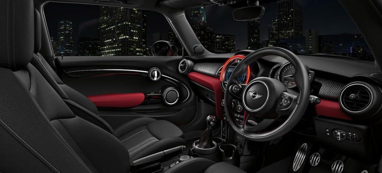 The sporty interior details include sport steering wheel, pedals and winged sport seats for extra support. The stylish detailing includes John Cooper Works logos on the steering wheel, gear stick, entry sills and pedals.