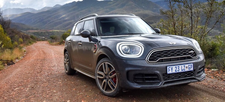 The John Cooper Works logo appears on the tailgate as well as on the hexagon radiator grille with characteristic honeycomb pattern.